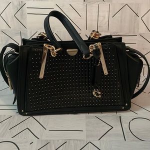 Black Coach satchel purse with gold hardware.